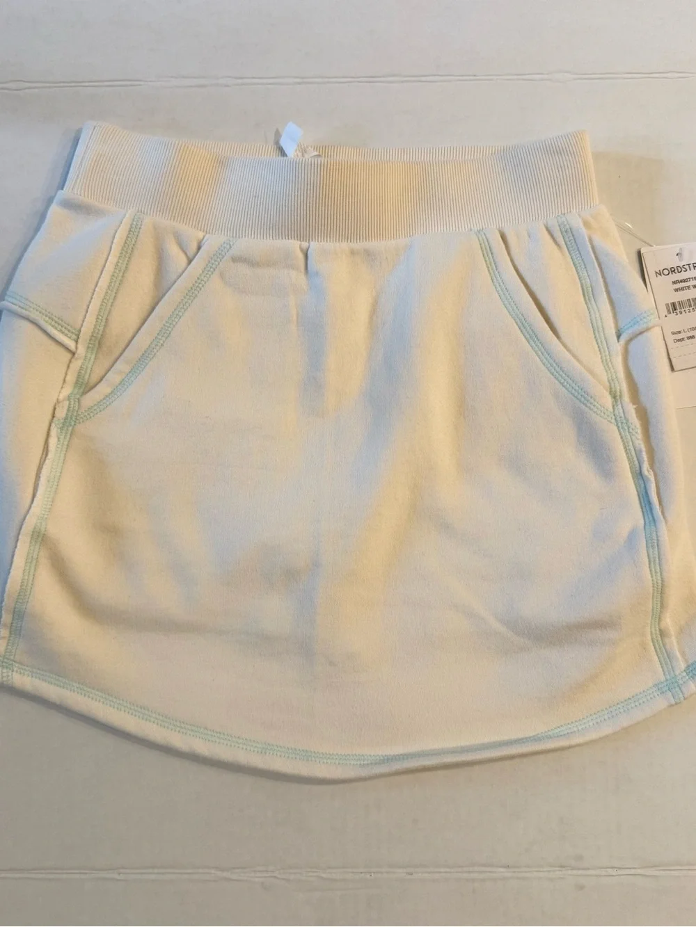 Zella Cream Mini Skirt with Contrast Stitching